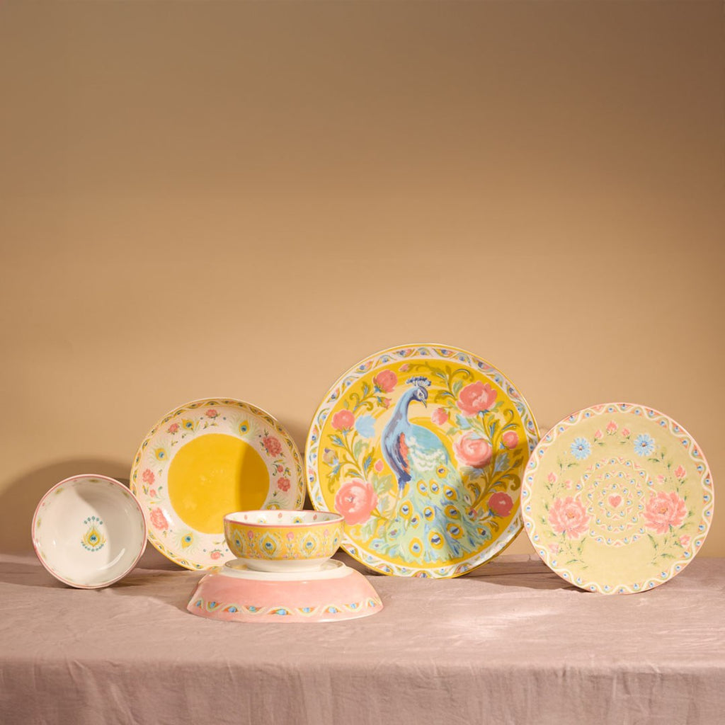 The full Pretty Past collection standing on pink linen