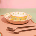 Pretty Past deep soup bowl with feather-inspired border in saffron yellow