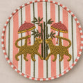 Stitches of the Wild dinner plate with hand-drawn leopards, bamboo and pink parasols